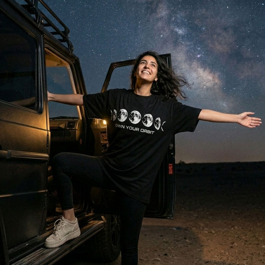 Own Your Orbit graphic tee front view — Suit Yourself Cairo